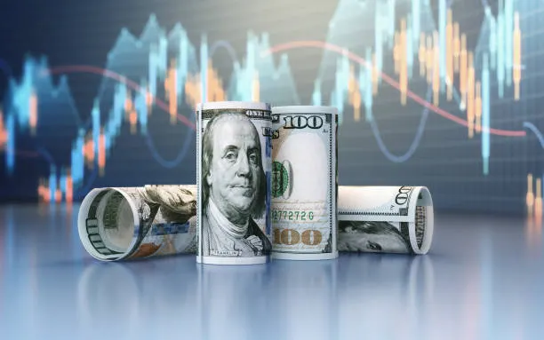 billete-de-100-signo-de-dólar-gráfico-financiero-profundidad-de-campo